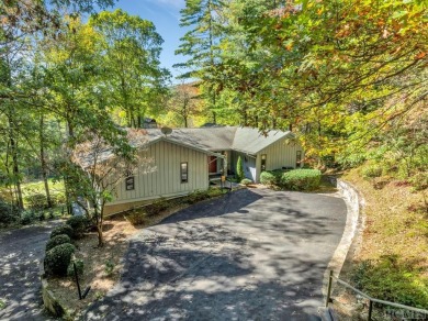 Remarkable golf course and mountain views from this immaculately on Lake Toxaway Country Club in North Carolina - for sale on GolfHomes.com, golf home, golf lot