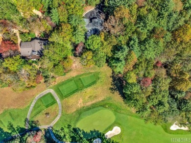 Remarkable golf course and mountain views from this immaculately on Lake Toxaway Country Club in North Carolina - for sale on GolfHomes.com, golf home, golf lot