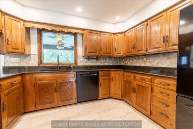 This one-of-a-kind home has it all--space, charm, updates, and on Riverside Country Club in Nebraska - for sale on GolfHomes.com, golf home, golf lot