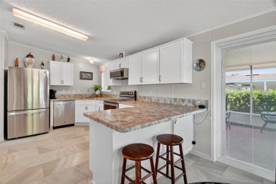 Here is your opportunity to own an impeccably maintained on Bay Tree Golf Course in Florida - for sale on GolfHomes.com, golf home, golf lot