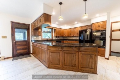 This one-of-a-kind home has it all--space, charm, updates, and on Riverside Country Club in Nebraska - for sale on GolfHomes.com, golf home, golf lot