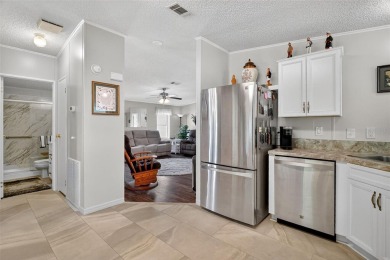 Here is your opportunity to own an impeccably maintained on Bay Tree Golf Course in Florida - for sale on GolfHomes.com, golf home, golf lot