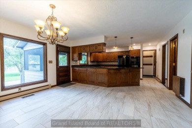 This one-of-a-kind home has it all--space, charm, updates, and on Riverside Country Club in Nebraska - for sale on GolfHomes.com, golf home, golf lot