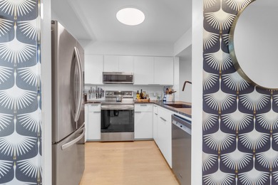 This marsh and sunset view villa has been totally renovated top on The Seabrook Island Club in South Carolina - for sale on GolfHomes.com, golf home, golf lot