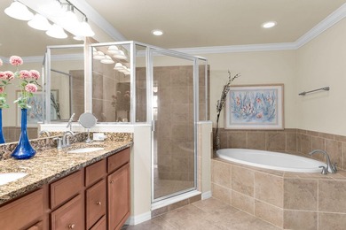 Enjoy a first-floor end-unit coach home with beautiful lake on The Rookery At Marco in Florida - for sale on GolfHomes.com, golf home, golf lot