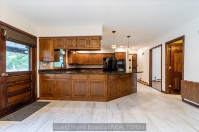 This one-of-a-kind home has it all--space, charm, updates, and on Riverside Country Club in Nebraska - for sale on GolfHomes.com, golf home, golf lot