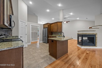 Located in the gated Woodlake Country Club community.

Tucked on Woodlake Country Club in North Carolina - for sale on GolfHomes.com, golf home, golf lot