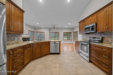 Located in the gated Woodlake Country Club community.

Tucked on Woodlake Country Club in North Carolina - for sale on GolfHomes.com, golf home, golf lot