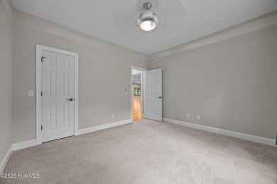 Located in the gated Woodlake Country Club community.

Tucked on Woodlake Country Club in North Carolina - for sale on GolfHomes.com, golf home, golf lot