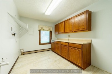 This one-of-a-kind home has it all--space, charm, updates, and on Riverside Country Club in Nebraska - for sale on GolfHomes.com, golf home, golf lot