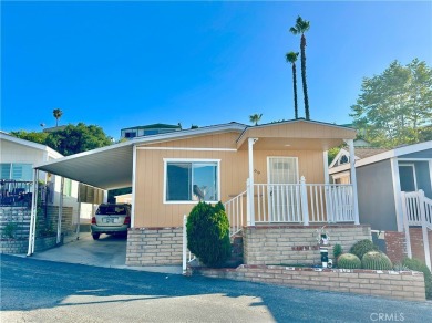 Tucked away in a quiet location backing to a serene hillside on Rolling Hills Country Club in California - for sale on GolfHomes.com, golf home, golf lot