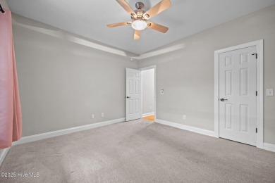 Located in the gated Woodlake Country Club community.

Tucked on Woodlake Country Club in North Carolina - for sale on GolfHomes.com, golf home, golf lot