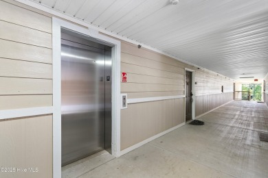 Nestled in Calabash, North Carolina, this third-floor on Crow Creek Golf Club in North Carolina - for sale on GolfHomes.com, golf home, golf lot