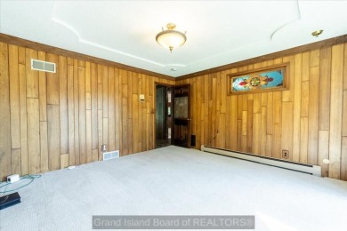 This one-of-a-kind home has it all--space, charm, updates, and on Riverside Country Club in Nebraska - for sale on GolfHomes.com, golf home, golf lot