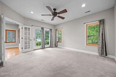Located in the gated Woodlake Country Club community.

Tucked on Woodlake Country Club in North Carolina - for sale on GolfHomes.com, golf home, golf lot