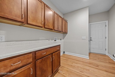 Located in the gated Woodlake Country Club community.

Tucked on Woodlake Country Club in North Carolina - for sale on GolfHomes.com, golf home, golf lot