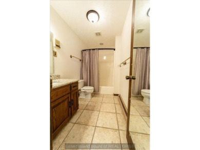 This one-of-a-kind home has it all--space, charm, updates, and on Riverside Country Club in Nebraska - for sale on GolfHomes.com, golf home, golf lot
