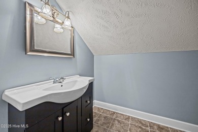 Located in the gated Woodlake Country Club community.

Tucked on Woodlake Country Club in North Carolina - for sale on GolfHomes.com, golf home, golf lot