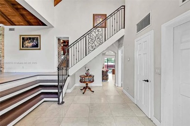 FABULOUS GOLF COURSE/LAKE/POOL GEM IN THE HIGHLY SOUGHT-AFTER on Jacaranda Golf Club in Florida - for sale on GolfHomes.com, golf home, golf lot