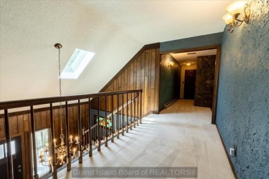 This one-of-a-kind home has it all--space, charm, updates, and on Riverside Country Club in Nebraska - for sale on GolfHomes.com, golf home, golf lot