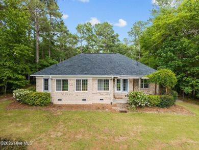 Located in the gated Woodlake Country Club community.

Tucked on Woodlake Country Club in North Carolina - for sale on GolfHomes.com, golf home, golf lot