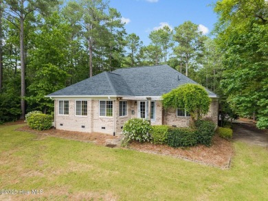Located in the gated Woodlake Country Club community.

Tucked on Woodlake Country Club in North Carolina - for sale on GolfHomes.com, golf home, golf lot