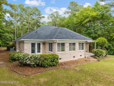 Located in the gated Woodlake Country Club community.

Tucked on Woodlake Country Club in North Carolina - for sale on GolfHomes.com, golf home, golf lot