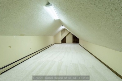 This one-of-a-kind home has it all--space, charm, updates, and on Riverside Country Club in Nebraska - for sale on GolfHomes.com, golf home, golf lot