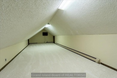 This one-of-a-kind home has it all--space, charm, updates, and on Riverside Country Club in Nebraska - for sale on GolfHomes.com, golf home, golf lot