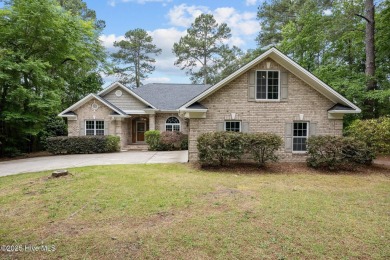 Located in the gated Woodlake Country Club community.

Tucked on Woodlake Country Club in North Carolina - for sale on GolfHomes.com, golf home, golf lot