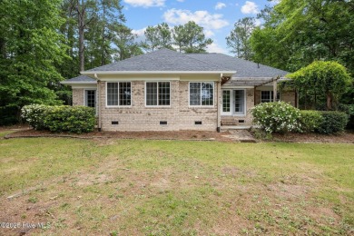 Located in the gated Woodlake Country Club community.

Tucked on Woodlake Country Club in North Carolina - for sale on GolfHomes.com, golf home, golf lot