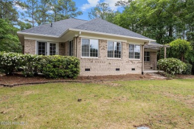 Located in the gated Woodlake Country Club community.

Tucked on Woodlake Country Club in North Carolina - for sale on GolfHomes.com, golf home, golf lot