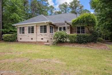 Located in the gated Woodlake Country Club community.

Tucked on Woodlake Country Club in North Carolina - for sale on GolfHomes.com, golf home, golf lot