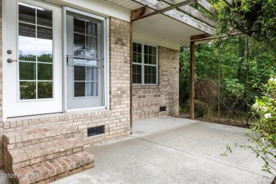 Located in the gated Woodlake Country Club community.

Tucked on Woodlake Country Club in North Carolina - for sale on GolfHomes.com, golf home, golf lot