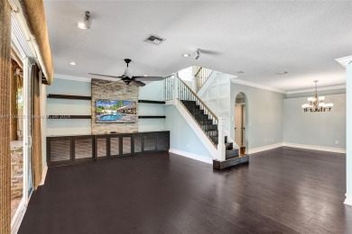 This true 5 BD | 2.5 BA gem has been remodeled with over $150k on The Links At Madison Green in Florida - for sale on GolfHomes.com, golf home, golf lot