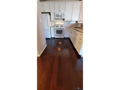 Welcome to 701 Masters Row, an exceptional third-floor corner on The Tradition Golf Club At The Crossings in Virginia - for sale on GolfHomes.com, golf home, golf lot