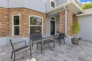 Welcome to this updated 4-bedroom, 3-bath pool home with a loft on North Shore Golf Club in Florida - for sale on GolfHomes.com, golf home, golf lot