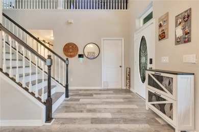 Welcome to this updated 4-bedroom, 3-bath pool home with a loft on North Shore Golf Club in Florida - for sale on GolfHomes.com, golf home, golf lot
