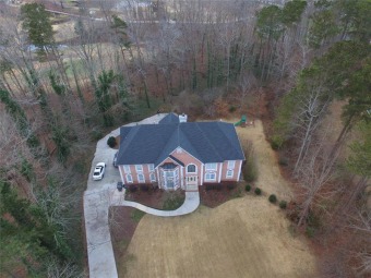 This magnificent executive home with no annual golf and HOA fees on Lake Spivey Golf Club in Georgia - for sale on GolfHomes.com, golf home, golf lot