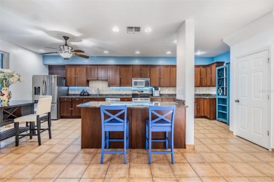 Discover a rare opportunity to own this exquisite 5-bedroom, 4 on Countryside Country Club in Florida - for sale on GolfHomes.com, golf home, golf lot