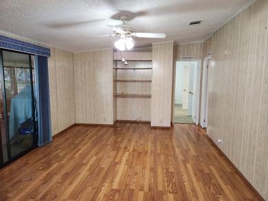 This spacious 2-bed/2-bath home with a den/family room situated on Spanish Lakes Fairways in Florida - for sale on GolfHomes.com, golf home, golf lot