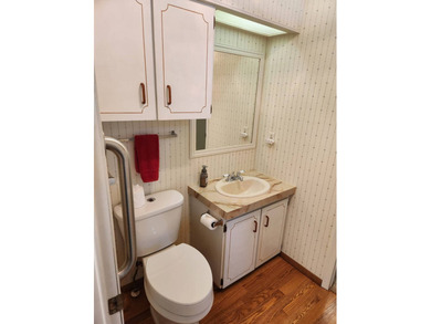 This spacious 2-bed/2-bath home with a den/family room situated on Spanish Lakes Fairways in Florida - for sale on GolfHomes.com, golf home, golf lot