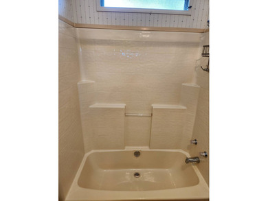 This spacious 2-bed/2-bath home with a den/family room situated on Spanish Lakes Fairways in Florida - for sale on GolfHomes.com, golf home, golf lot