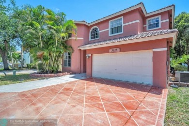 Discover this beautiful 2-story residence at the gated community on Palm-Aire Country Club and Resort - The Oaks in Florida - for sale on GolfHomes.com, golf home, golf lot