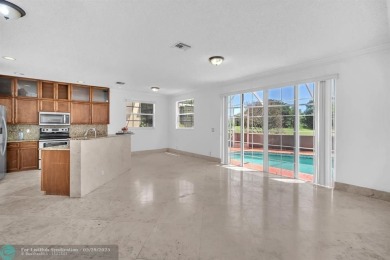 Discover this beautiful 2-story residence at the gated community on Palm-Aire Country Club and Resort - The Oaks in Florida - for sale on GolfHomes.com, golf home, golf lot