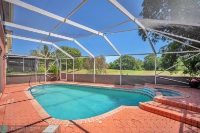 Discover this beautiful 2-story residence at the gated community on Palm-Aire Country Club and Resort - The Oaks in Florida - for sale on GolfHomes.com, golf home, golf lot
