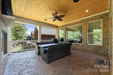 Take a look at this stunning, well maintained all brick home on Cowans Ford Country Club in North Carolina - for sale on GolfHomes.com, golf home, golf lot