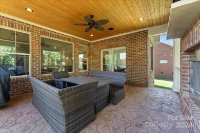 Take a look at this stunning, well maintained all brick home on Cowans Ford Country Club in North Carolina - for sale on GolfHomes.com, golf home, golf lot