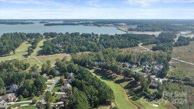 Take a look at this stunning, well maintained all brick home on Cowans Ford Country Club in North Carolina - for sale on GolfHomes.com, golf home, golf lot