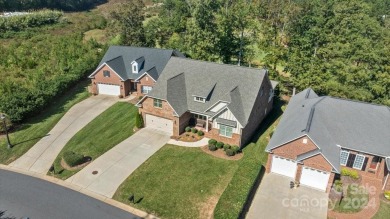 Take a look at this stunning, well maintained all brick home on Cowans Ford Country Club in North Carolina - for sale on GolfHomes.com, golf home, golf lot